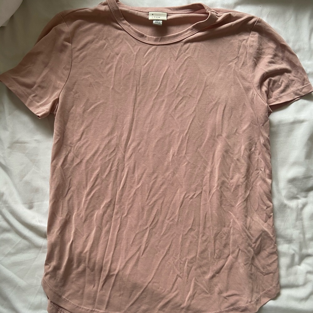 Soft, loose fitting pink tee